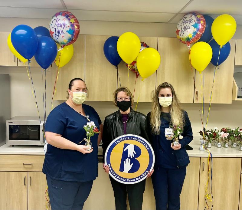 Polly Smale celebrates the excellent care her late wife Char Reid received from the nursing team at Beebe’s Tunnell Cancer Center. Shown are (l-r) nurse Morgan Iseman, Smale and nurse Megan Gherke. SUBMITTED PHOTO